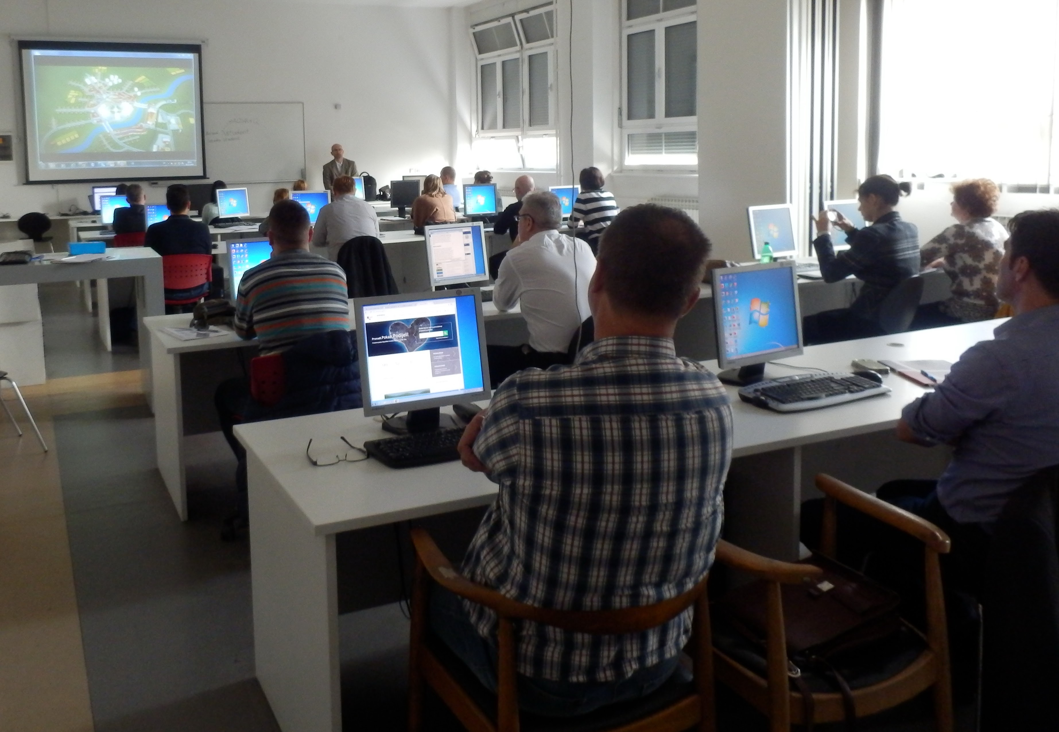 The picture shows the participants of the tenth NSDI workshop held at the Faculty of Geodesy during the presentation of Tomislav Ciceli.